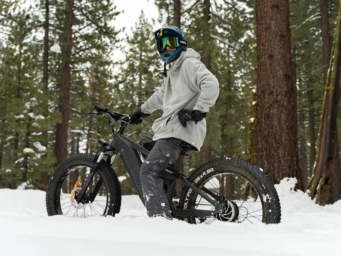 Rider on a Himiway D7 fat tire e-bike in the snow