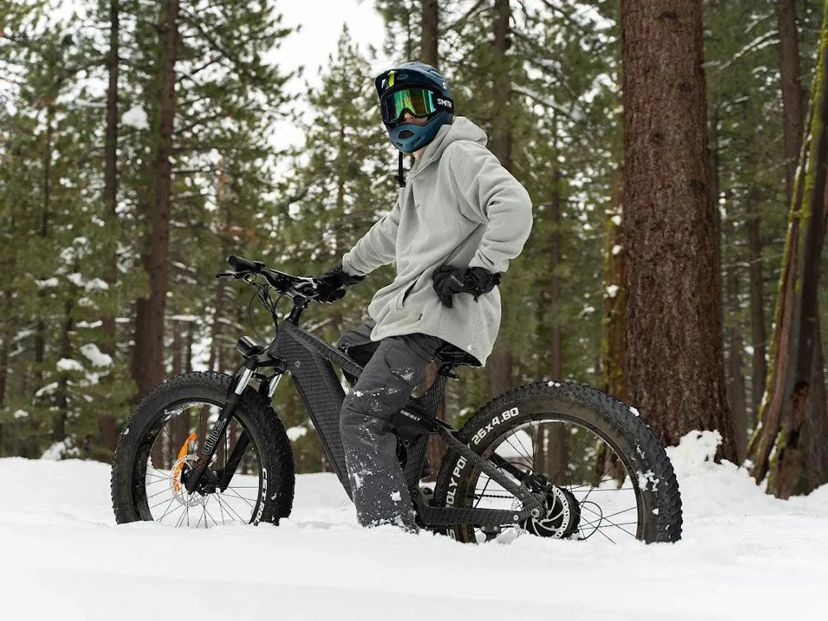 Rider on a Himiway D7 fat tire e-bike in the snow