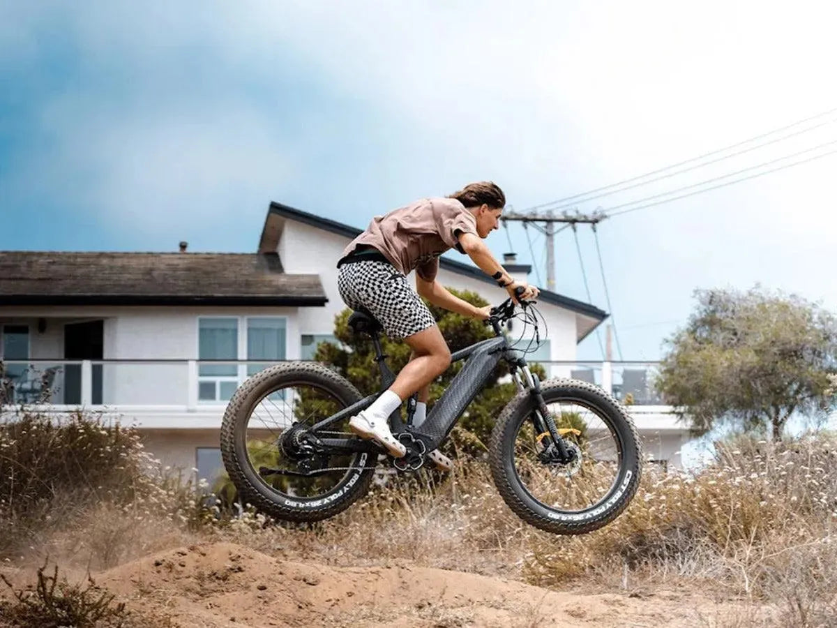 Rider on a Himiway D7 e-bike on a dirt trail
