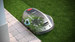 Sunseeker X5 Gen2 cutting close to a paved edge