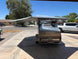 BunduAwn awning deployed on vehicle