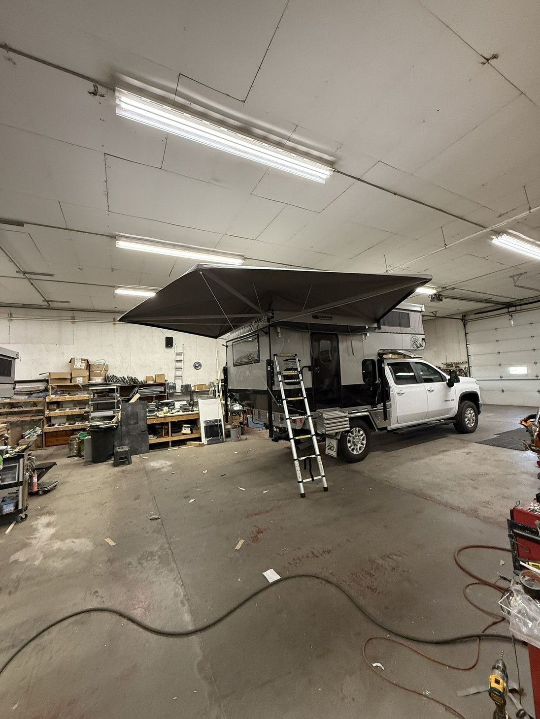 BunduHalf 90-degree self-supported awning on truck camper, side view