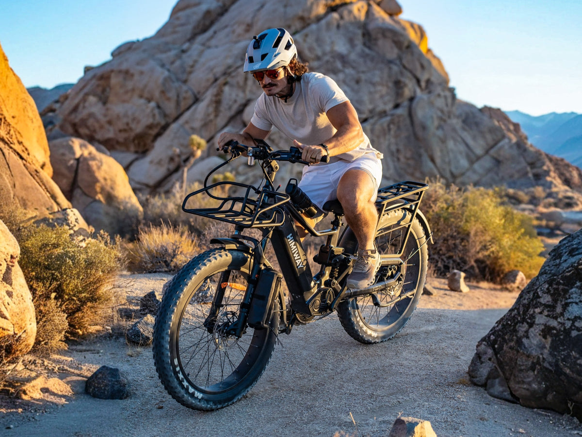 Rider on a Himiway D5 2.0 among desert boulders