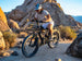 Rider on a Himiway D5 2.0 among desert boulders