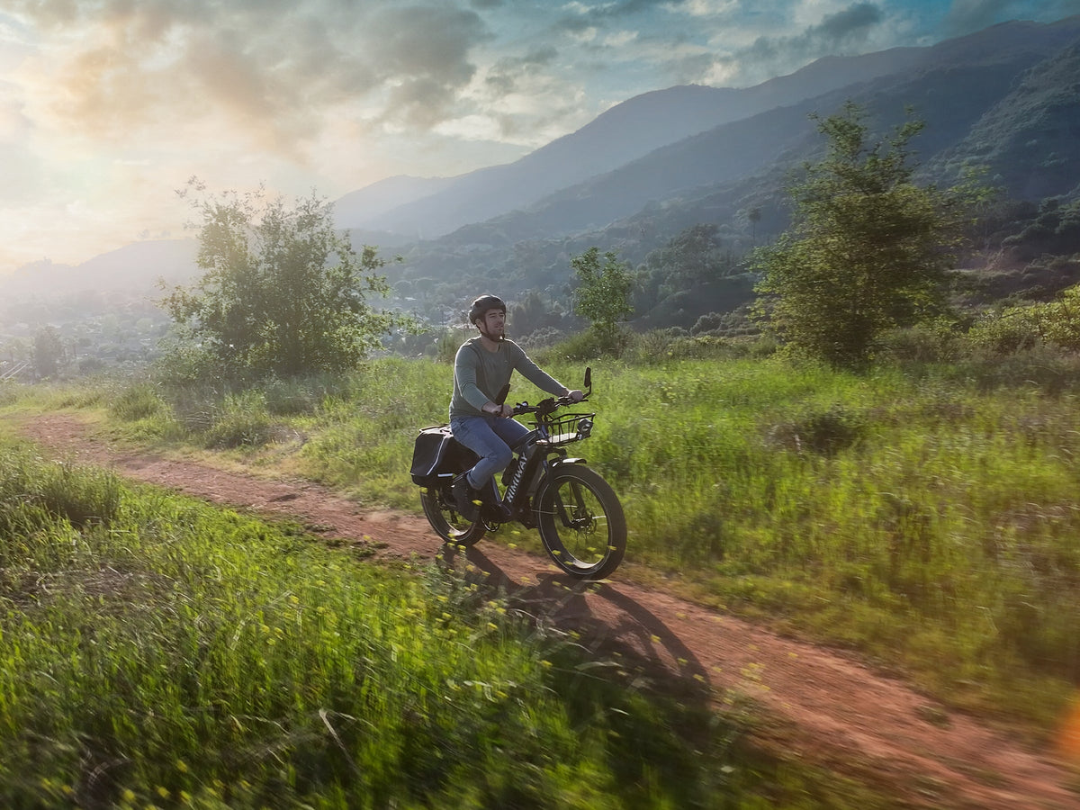 Rider on a Himiway D5 on a hillside trail