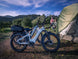 Himiway D5 e-bikes at a mountain campsite