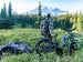 Himiway D5 2.0 Camo e-bike with a gear trailer in a mountain meadow