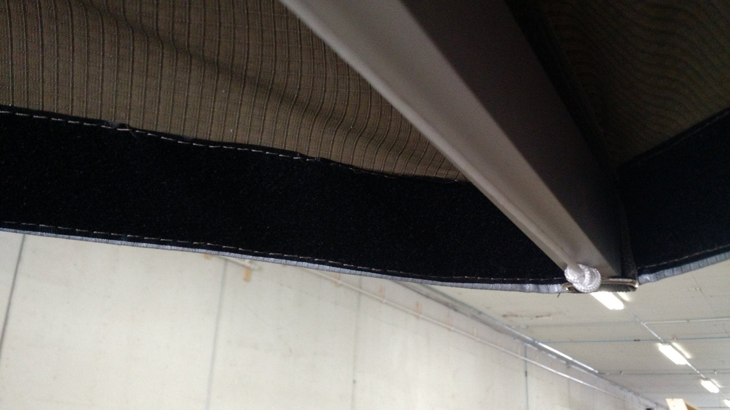 Velcro strips on the edge of BunduAwn material for side panel attachment
