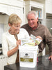 Legacy Food Storage 60 Serving Certified Gluten Free Entrée Bucket lifestyle image of a couple reading together