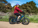 Rider on the Himiway D5 2.0 20 inch e-bike on a coastal trail