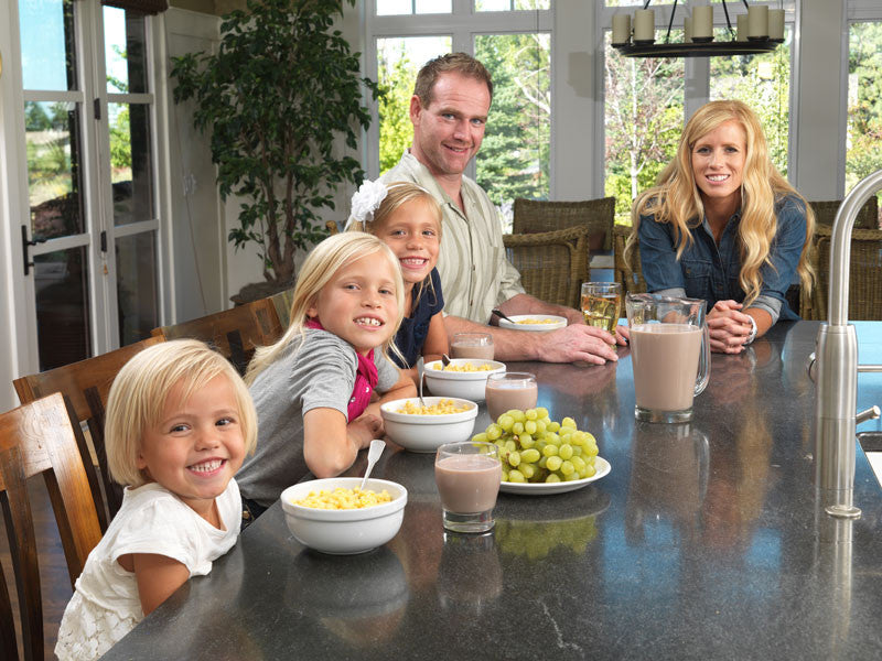 Legacy Food Storage 120 Serving Certified Gluten Free Entree Bucket lifestyle image of family eating prepared meals
