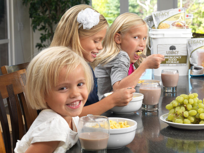 Legacy Food Storage 720 Serving Package lifestyle photo of a girl eating a prepared meal