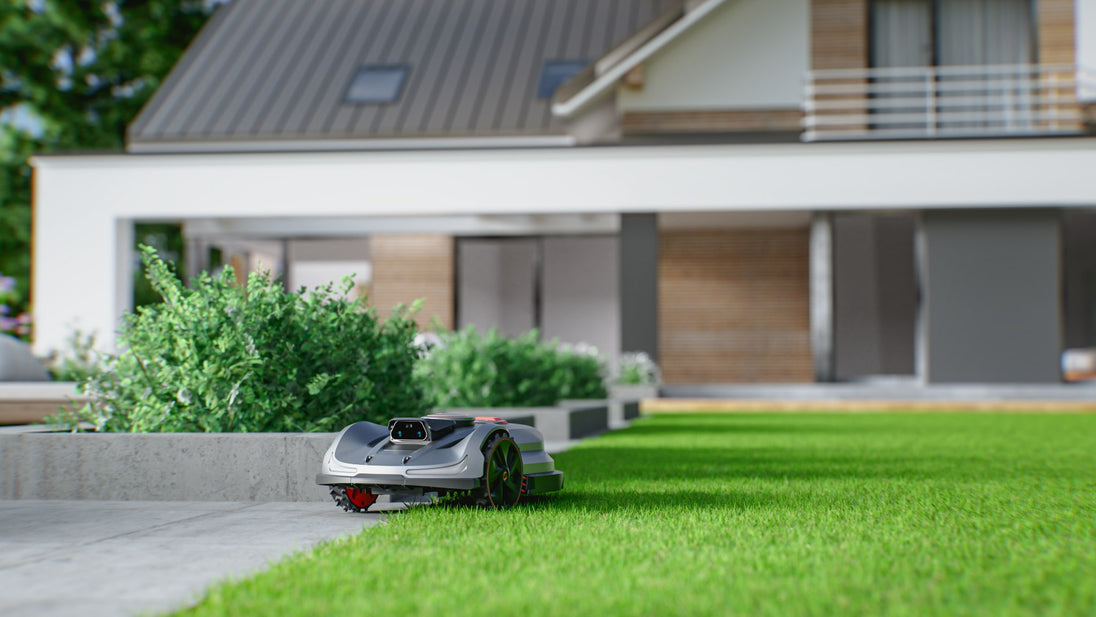 Sunseeker X7 Gen2 following the lawn edge beside a modern house