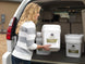 Legacy Food Storage 240 Serving Package lifestyle image showing portable packages loaded in a car